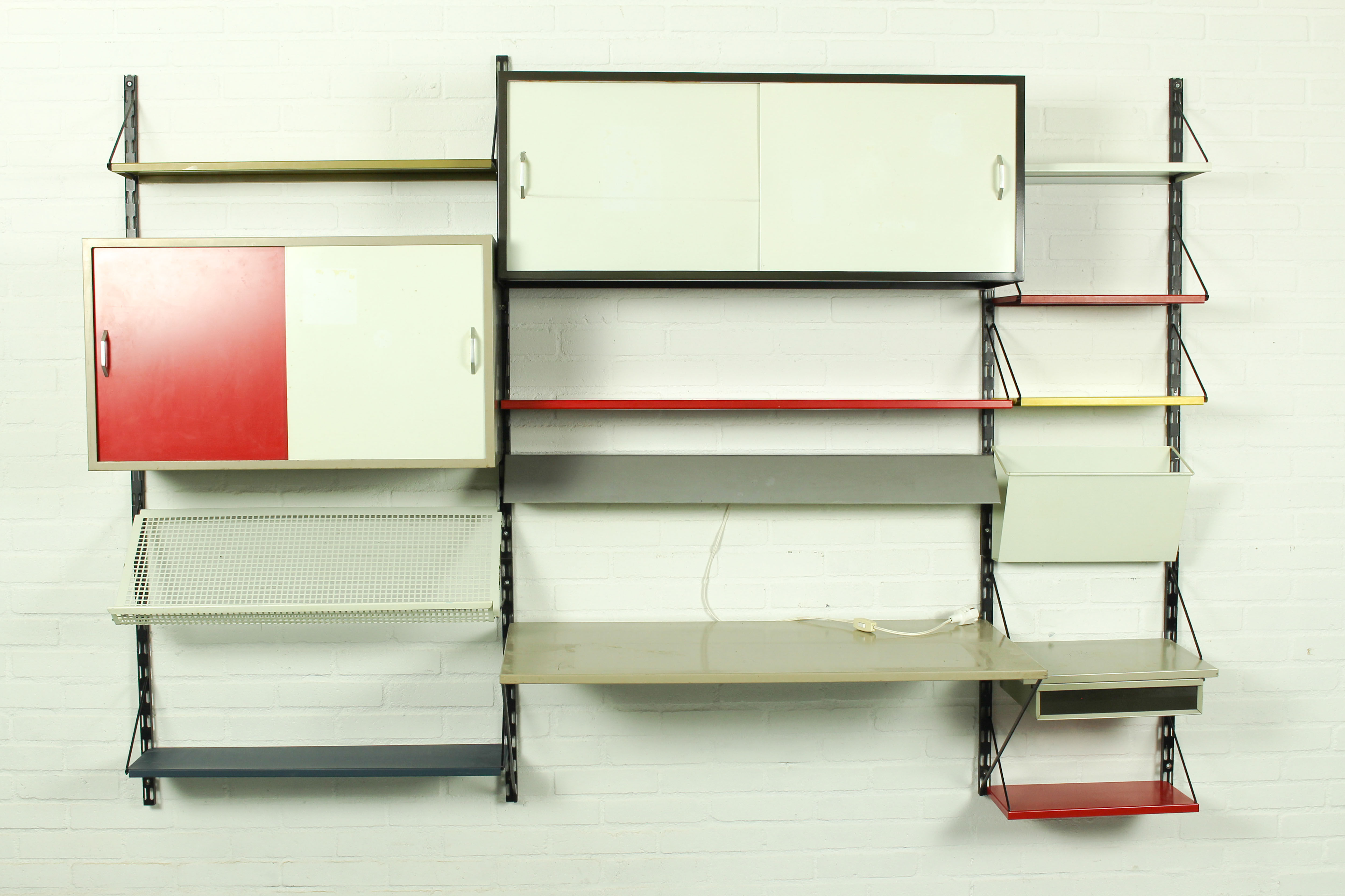 Wall Unit by Tjerk Reijenga for Pilastro with die cut magazine shelve