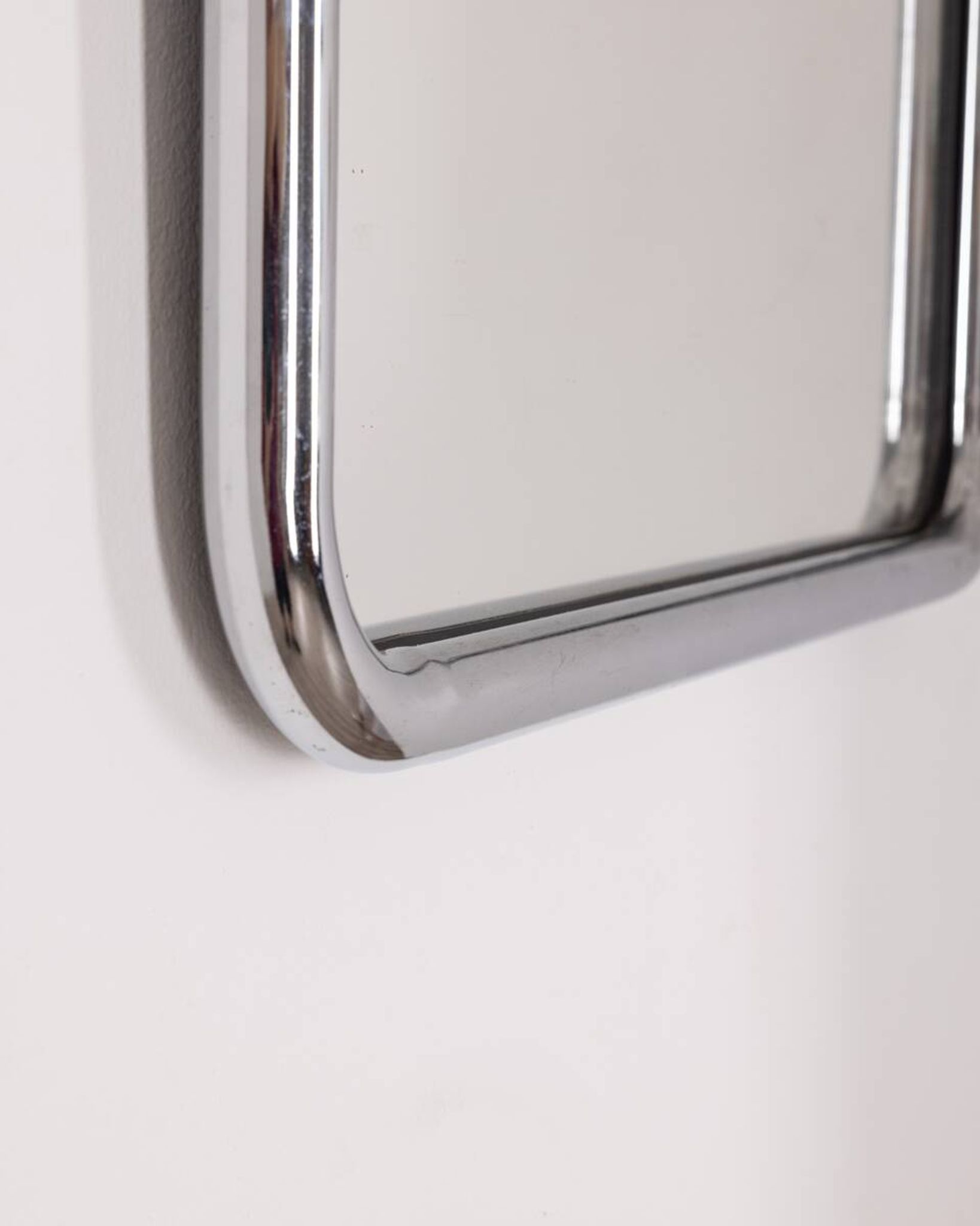 Vintage 60's wall mirror in chrome metal italian design