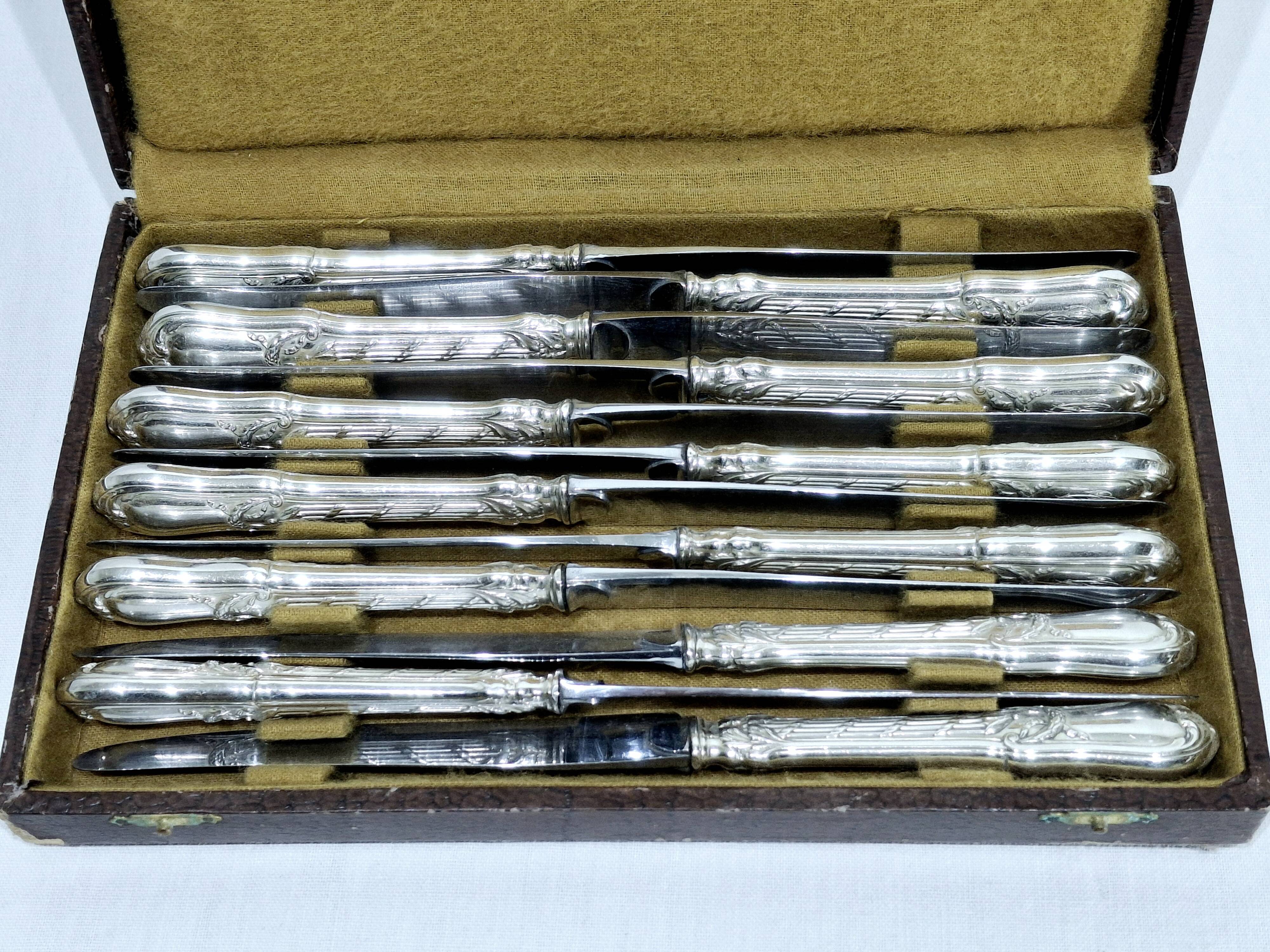 MARTIAL GAUTHIER / GEORGES FLAKENBERG - 12 KNIVES WITH SILVER HANDLES