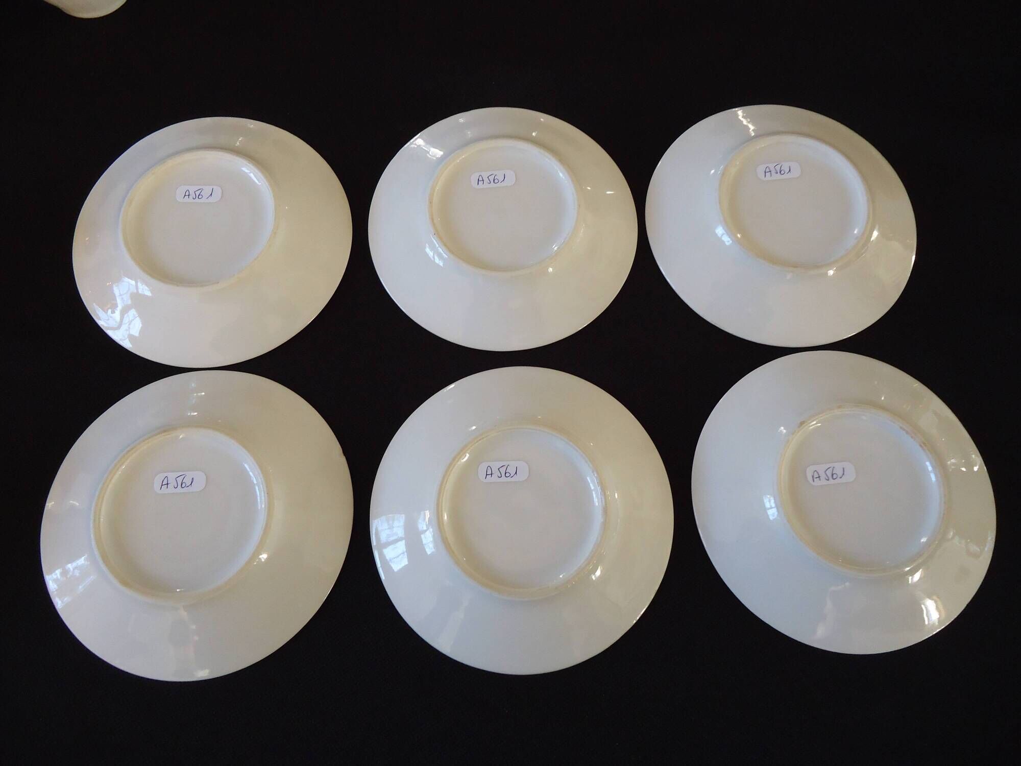 Set of six Art Deco white fine porcelain coffee cups and saucers
