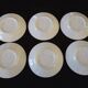 Set of six Art Deco white fine porcelain coffee cups and saucers