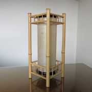 Large bamboo lamp with a tubular shade from the 70s and 80s.