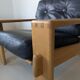 Pair of raw oak and leather armchairs by Esko Pajamies for Asko, Finland.