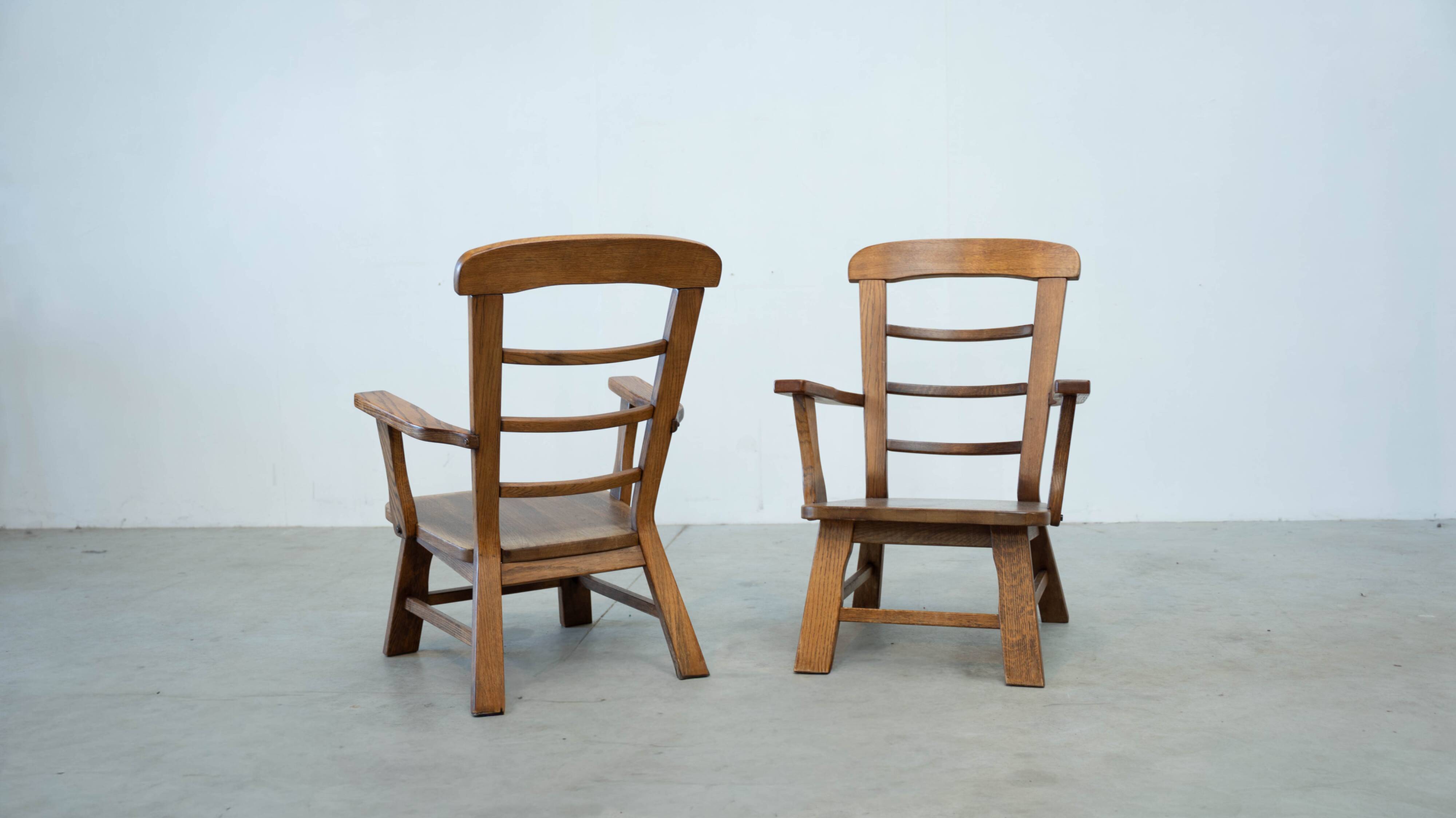 Set of two oak lounge chairs