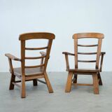 Set of two oak lounge chairs