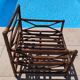 Vintage wooden garden furniture set with a bench and an armchair