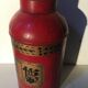 Asian red metal pot with lid