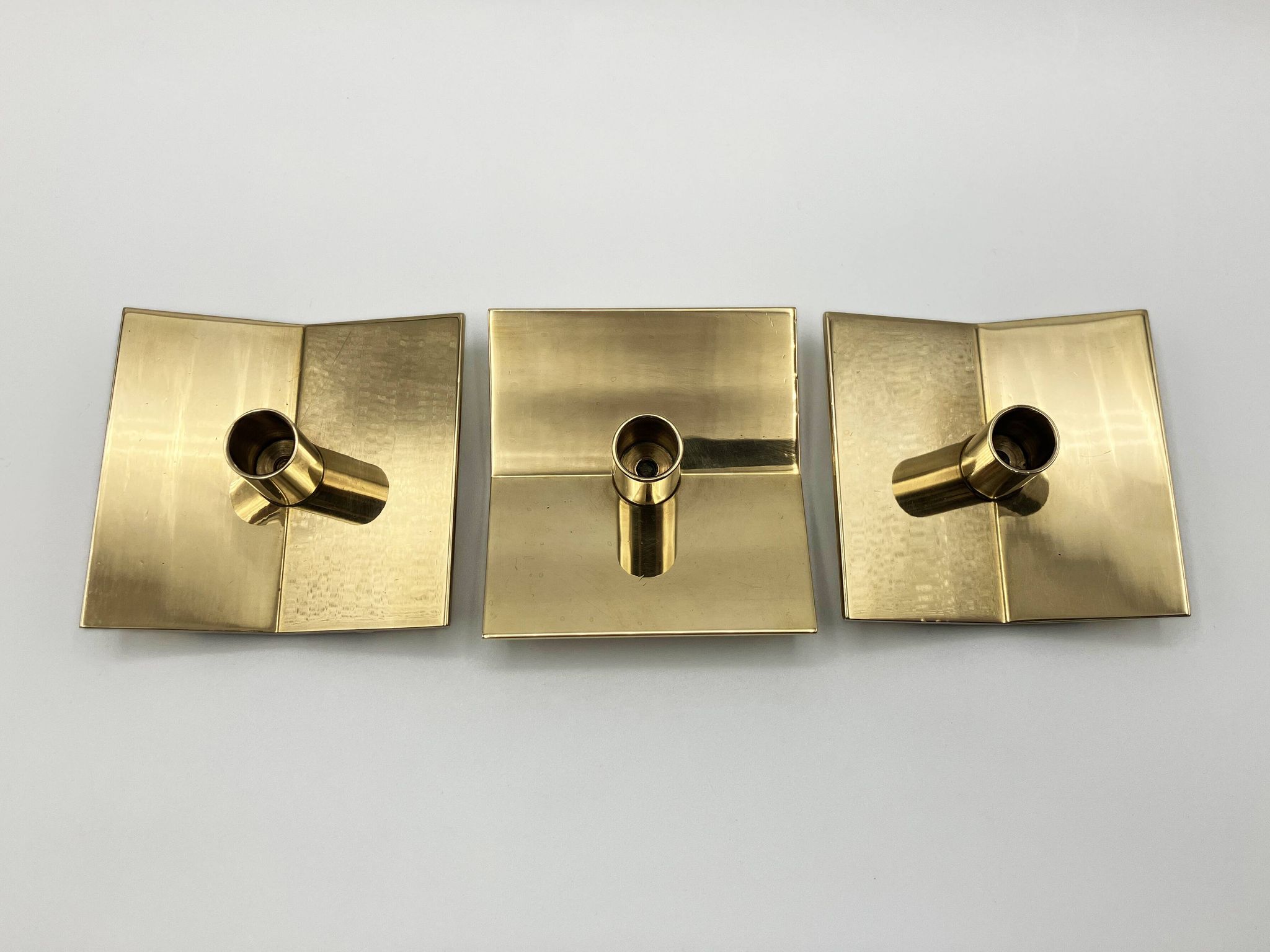 3 “Profile” candlesticks no. 70 in brass • Design Pierre Forssel for Skultuna Éditions • 1960
