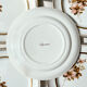 8 Petites assiettes en porcelaine OLYMPIA motif fleuris et dorure