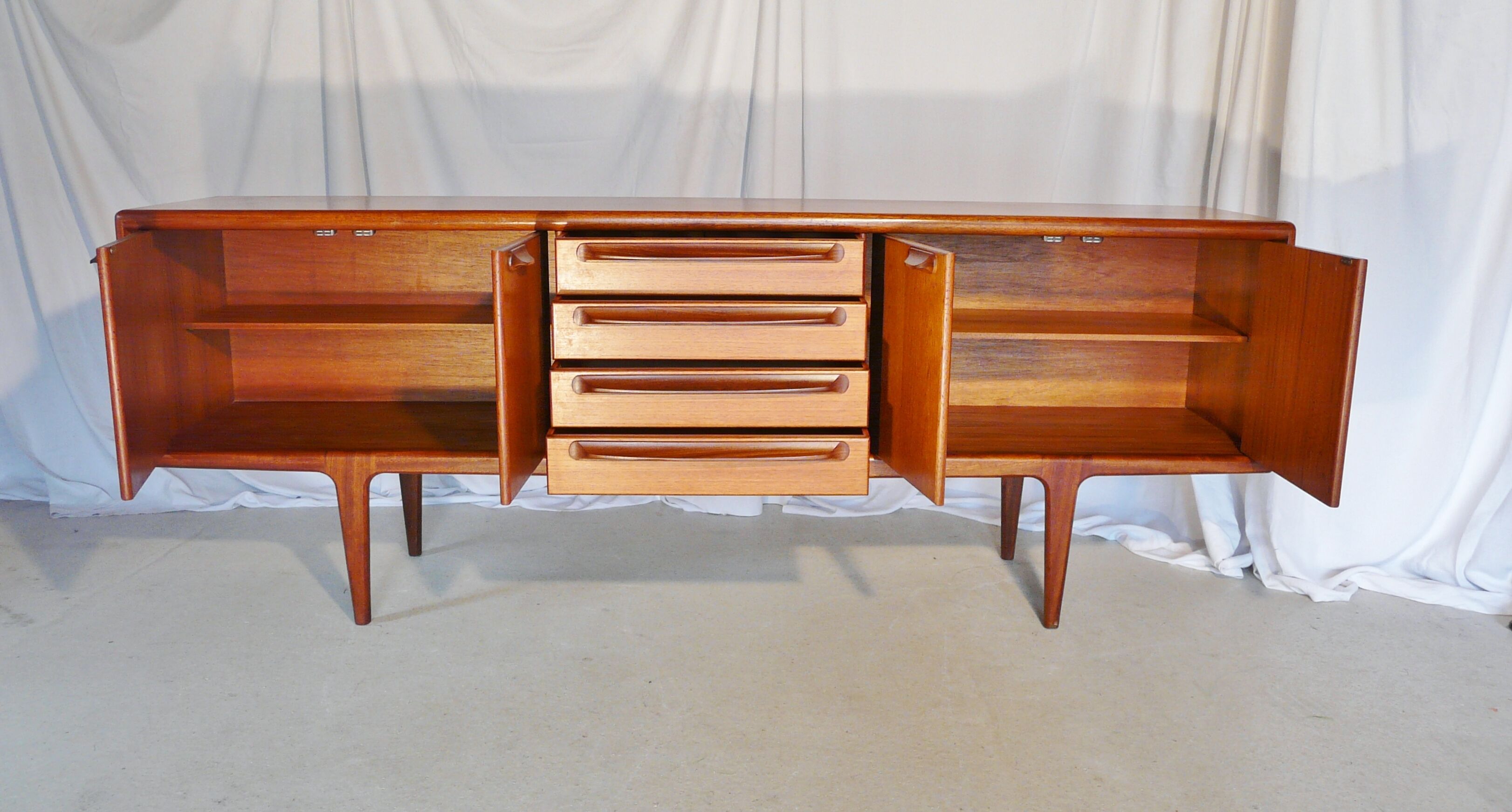 Younger Scandinavian teak strand