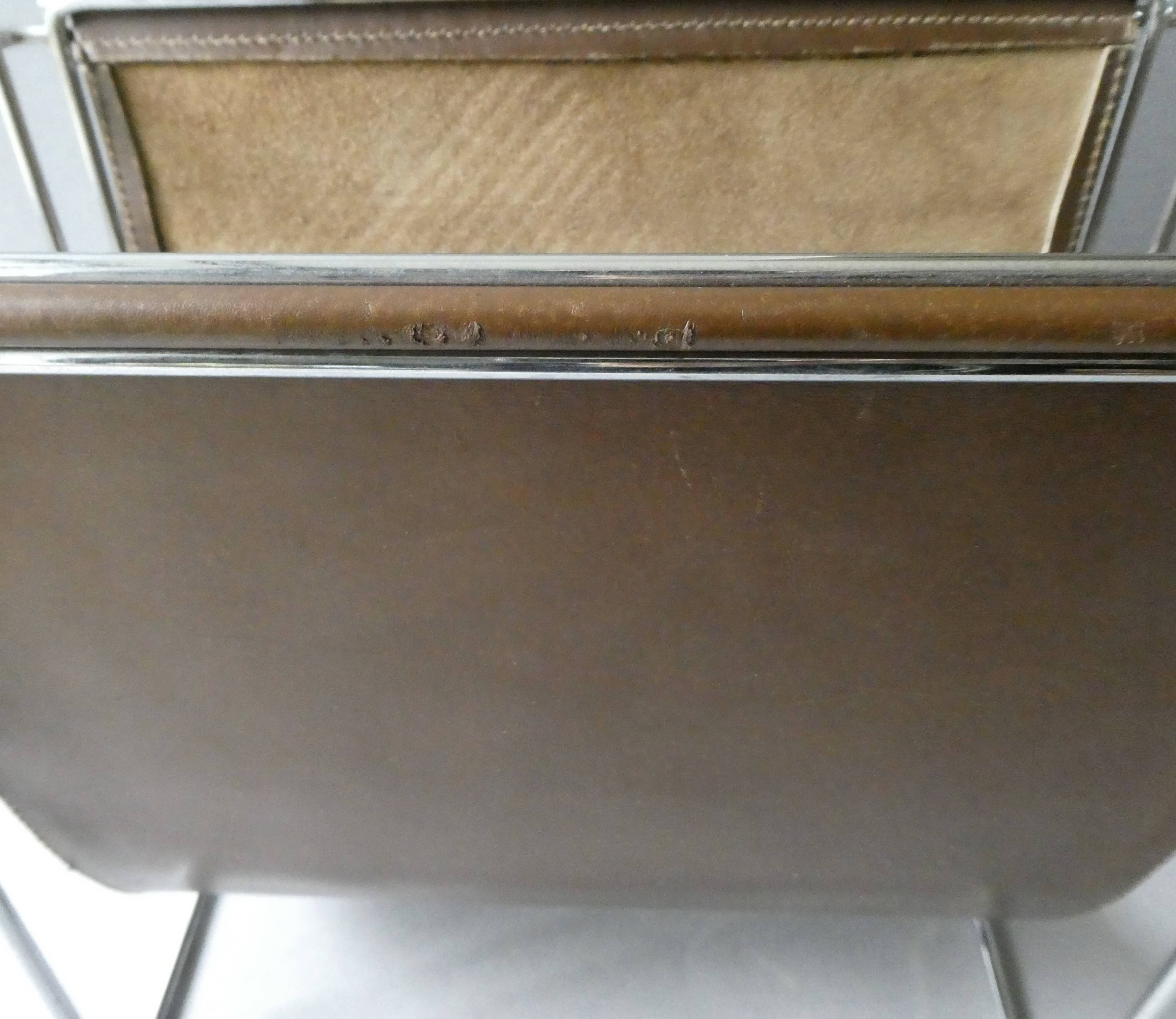 Gérard Rignault Group S.A. magazine rack from the 70s, metal and leather