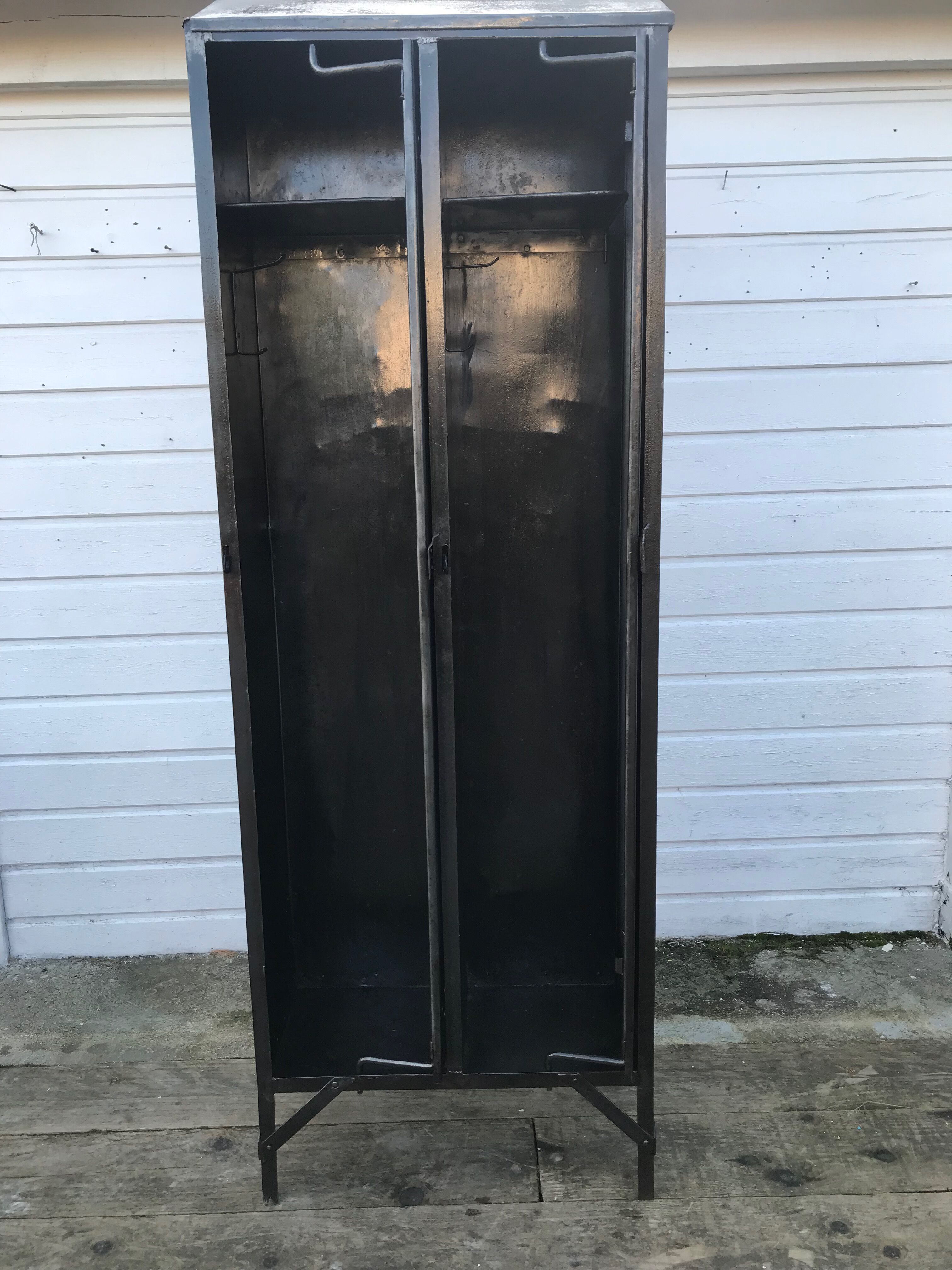 Antique riveted metal cloakroom