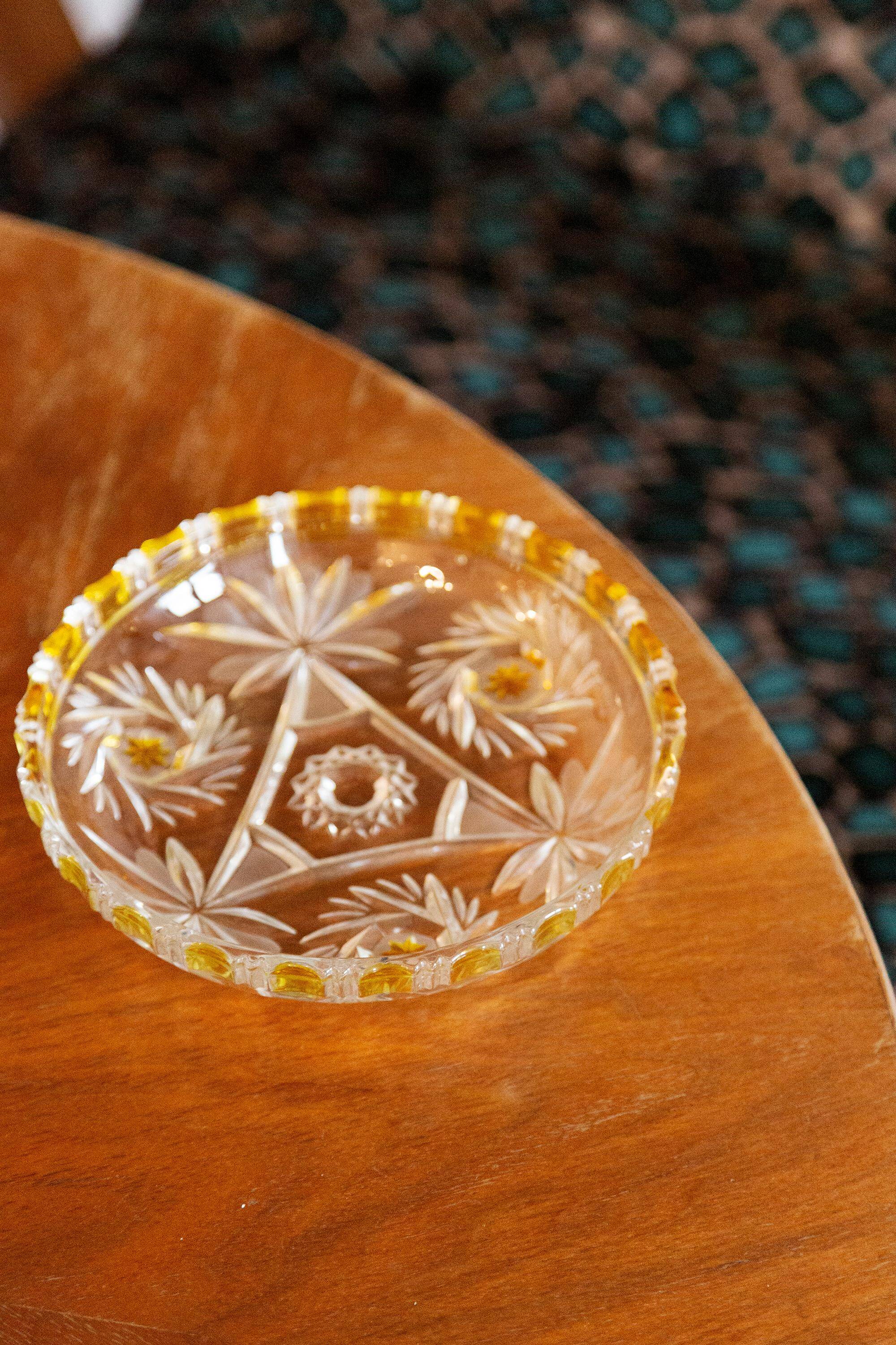 Decorative plate in transparent and vintage yellow glass, Italy, 1960s.