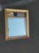 Antique gilded stucco mirror from the 19th century.