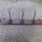 Old coat door has 5 racks
