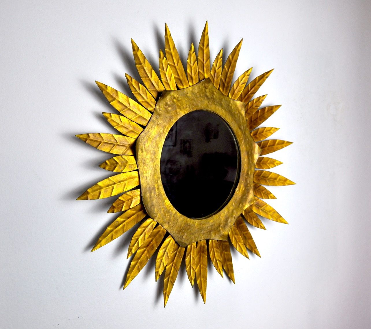 Miroir soleil, gilded metal with gold leaf, Italy, 1960