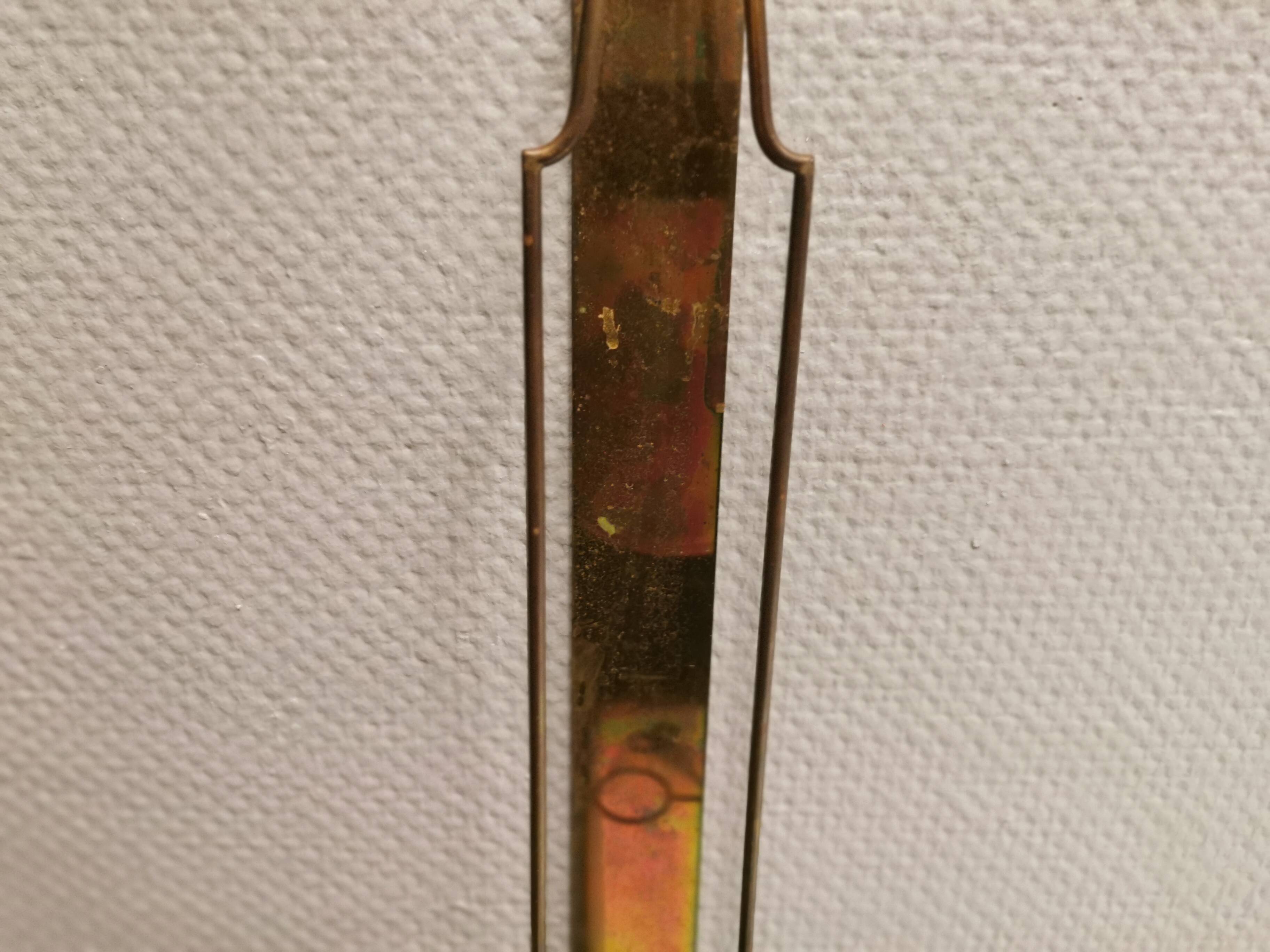 Old Wall hung brass candle holder.