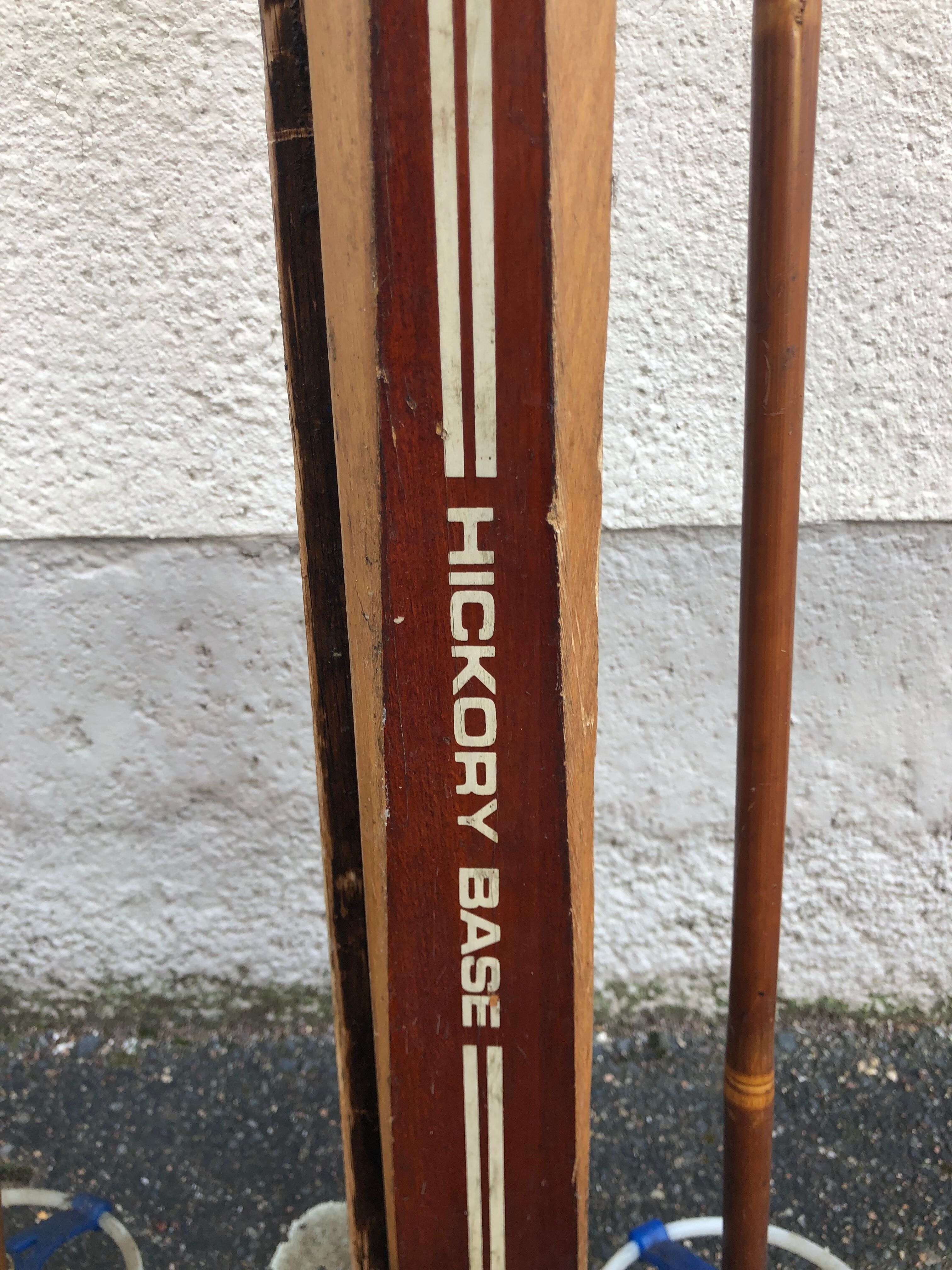 Vintage skis with poles