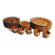 Terracotta service decorated with psychedelic drips