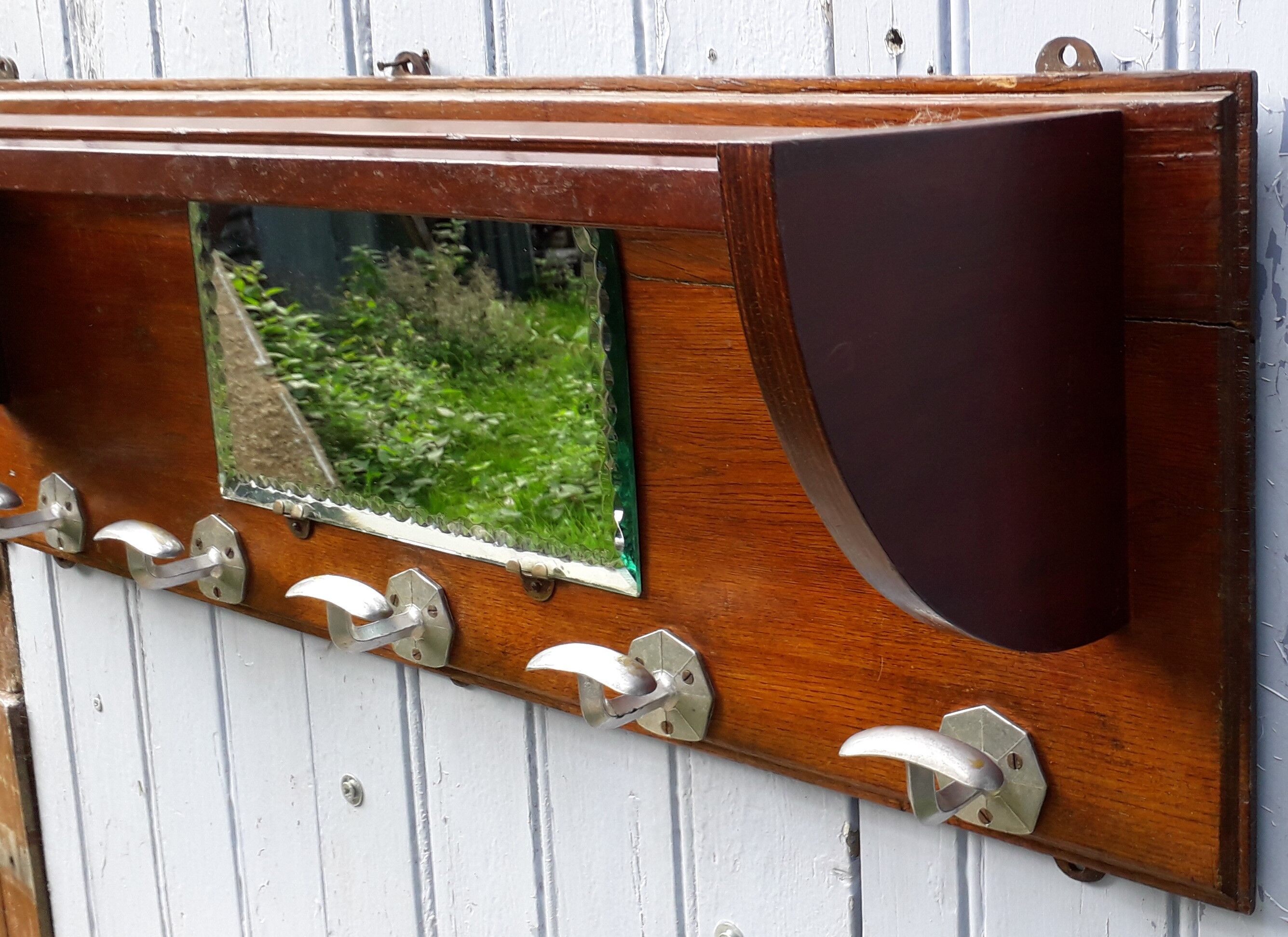 Art deco wall coat holder