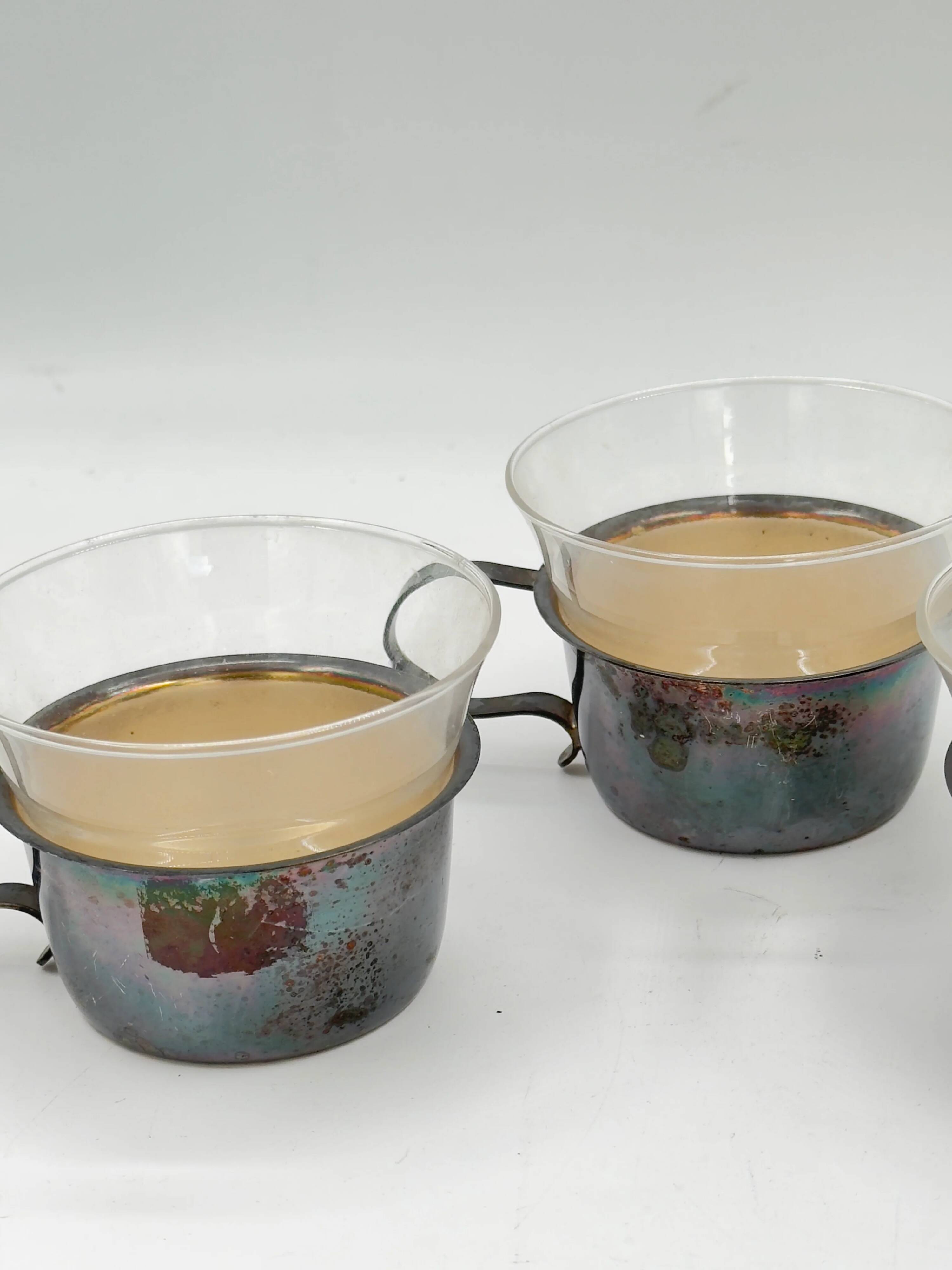Set of 3 vintage tea glasses with silver-plated holders.