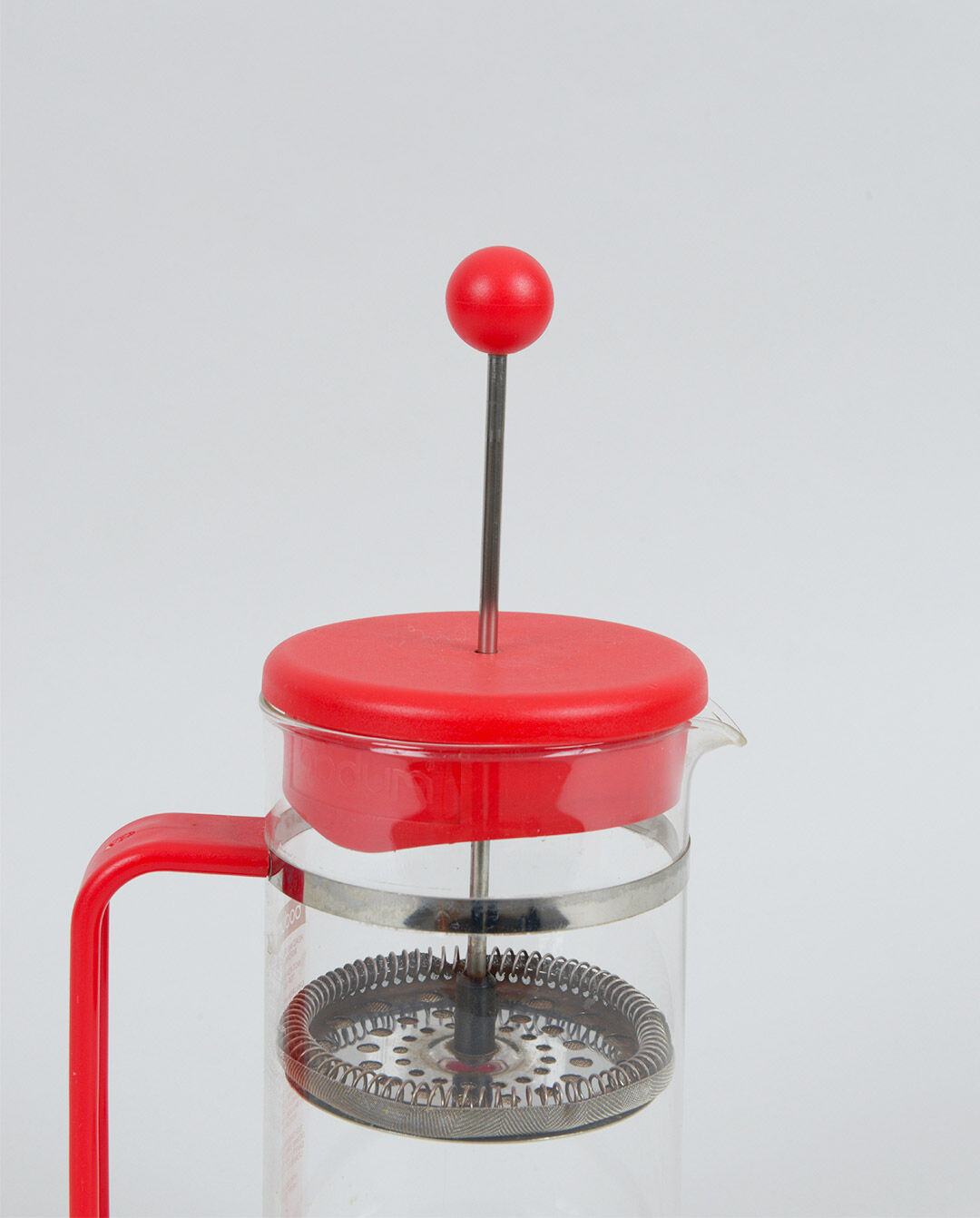 Red Bodum coffee maker
