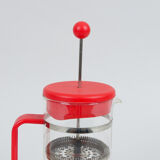 Red Bodum coffee maker