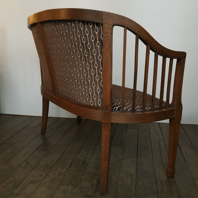 Old wooden and velvet bench