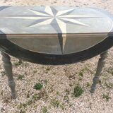 Oval campaign table with stolen solid wood