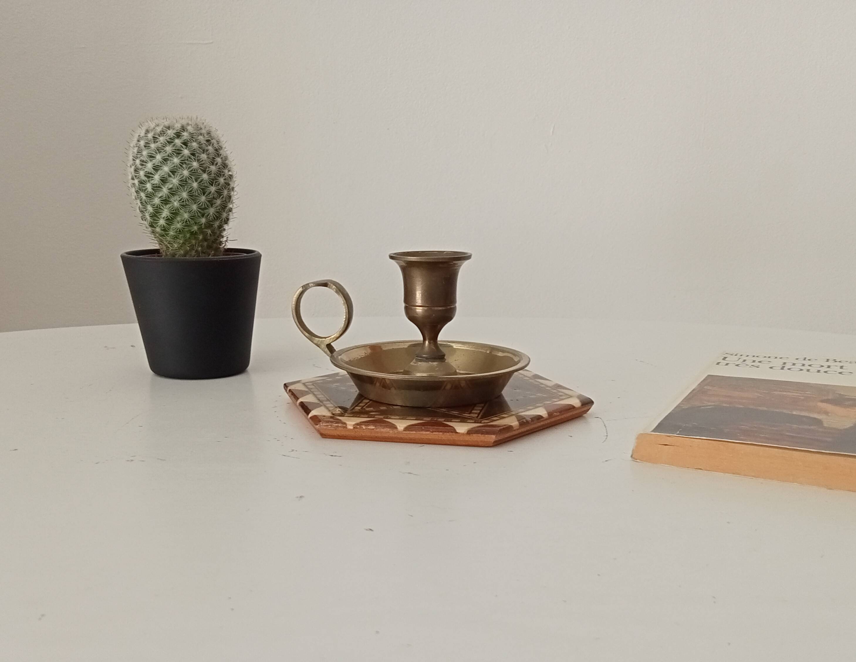 Vintage brass candle holder in gold.