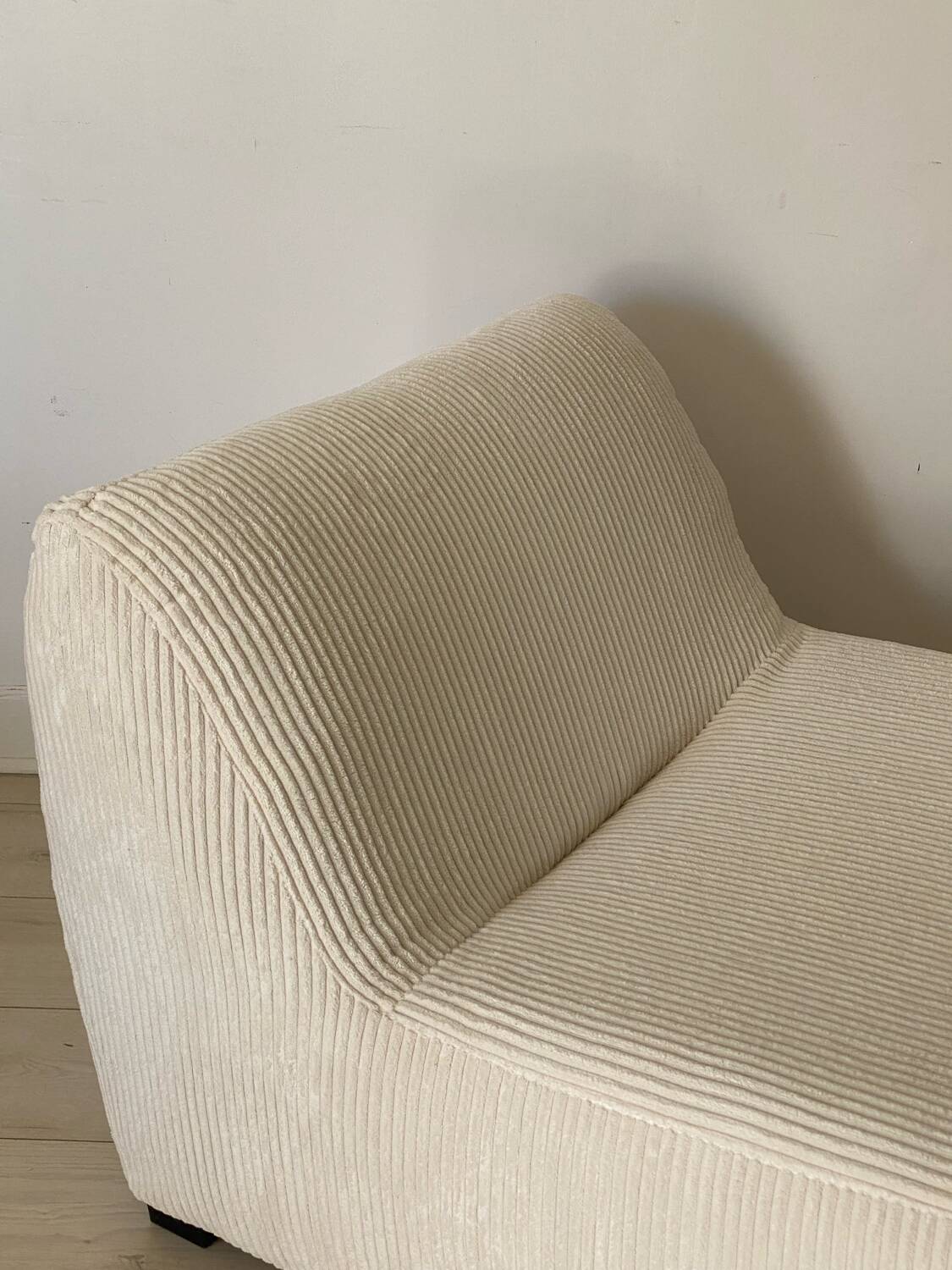 White corduroy armchair