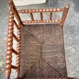 Antique Bobbin armchair with straw seat