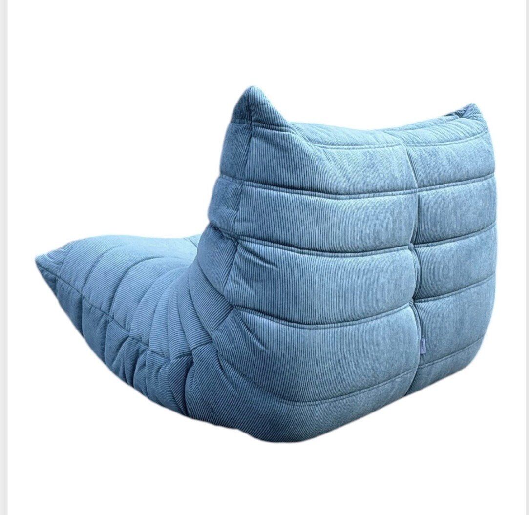 Togo lounge chair in light blue corduroy by Michel Ducaroy for Ligne Roset
