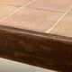 Table basse d'angle avec plateau en céramique Barrois