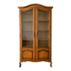 Antique wooden display cabinet with glass doors.