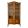 Antique wooden display cabinet with glass doors.