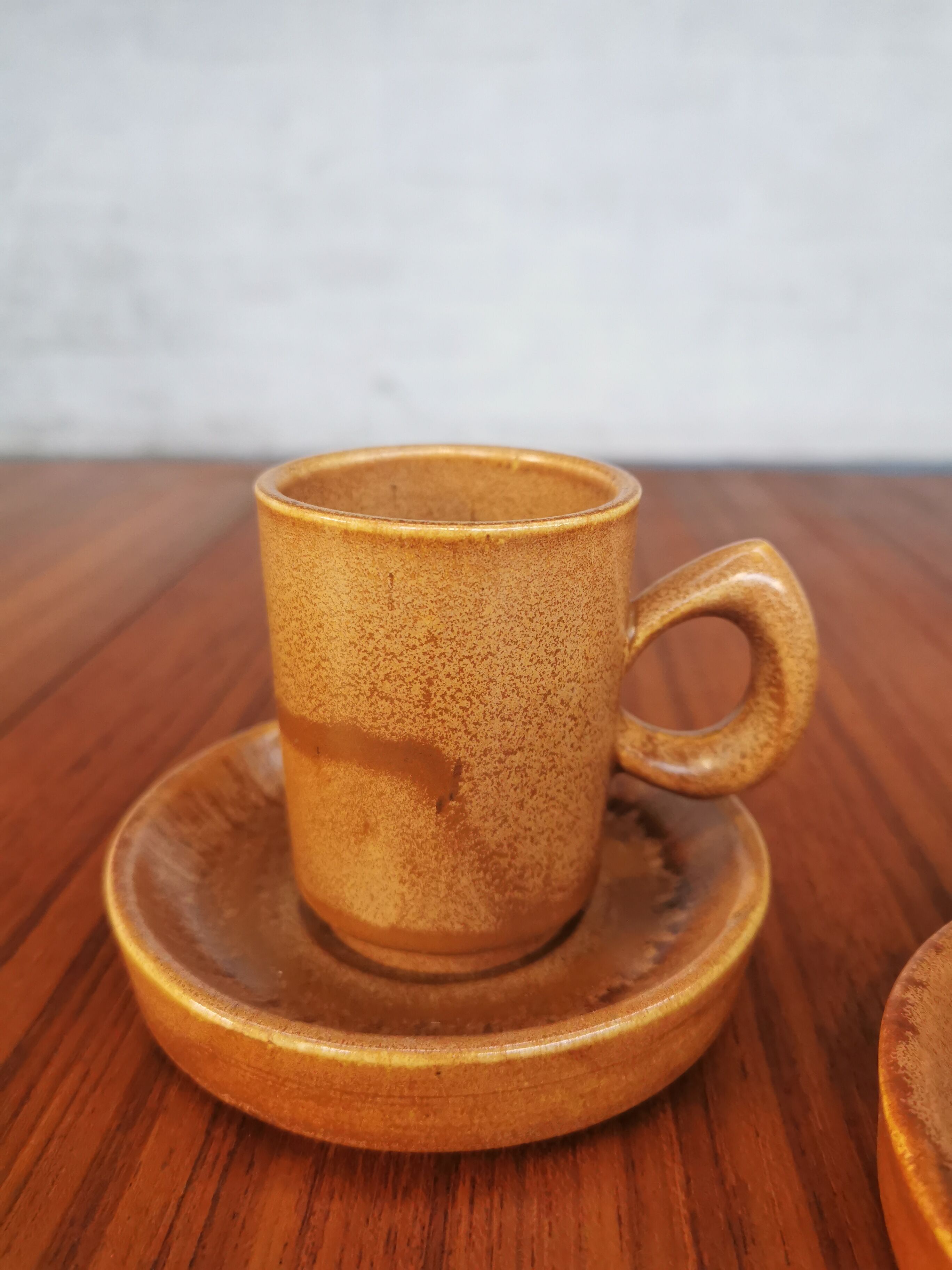 Duo of vintage stoneware cups