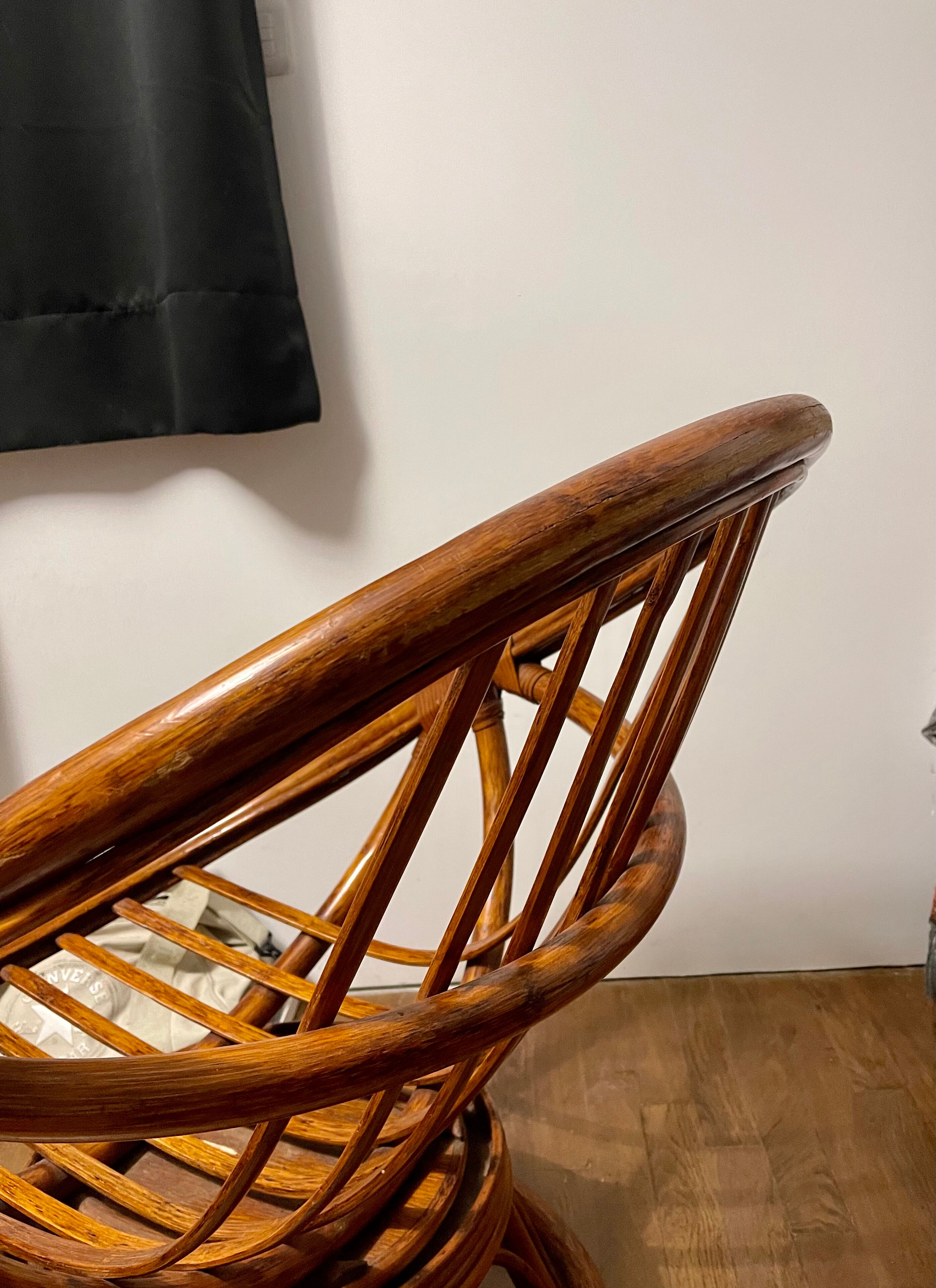 Swivel rattan armchair