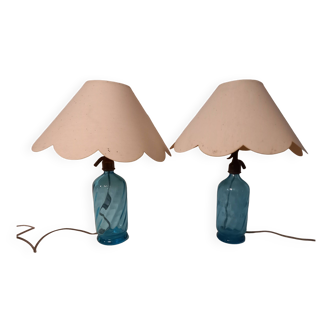Pair of lamps mounted on old blue glass siphons