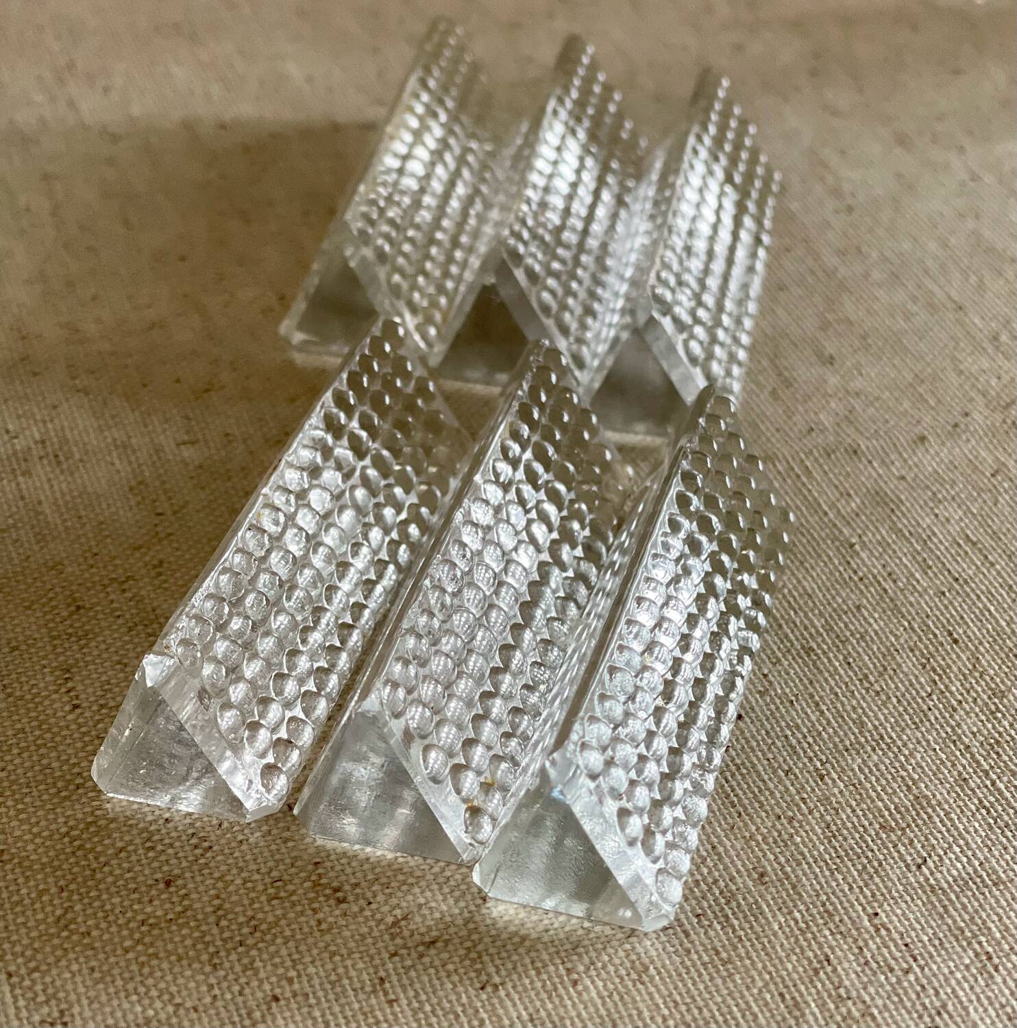 12 glass knife holders.