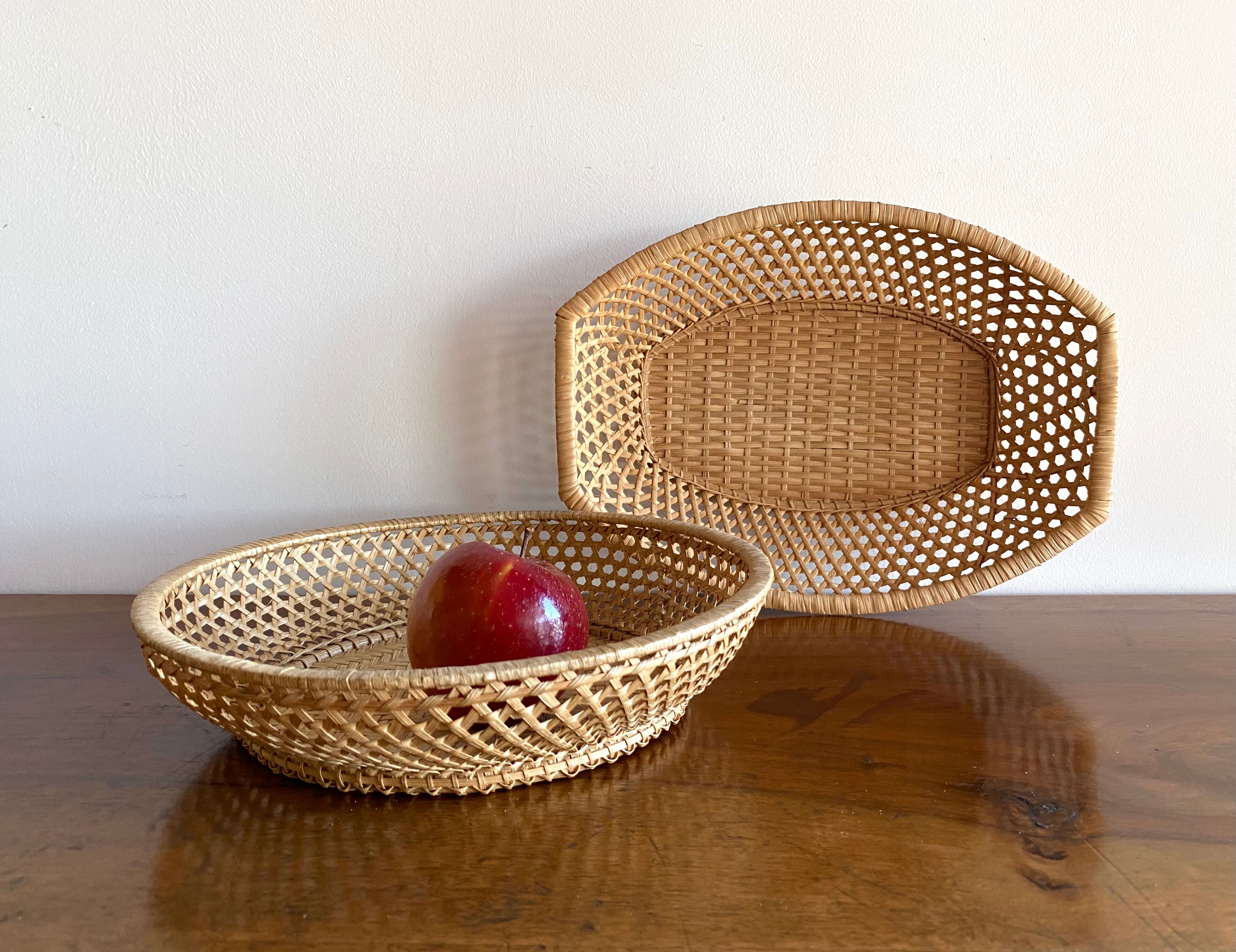 Pair of vintage braided rattan baskets