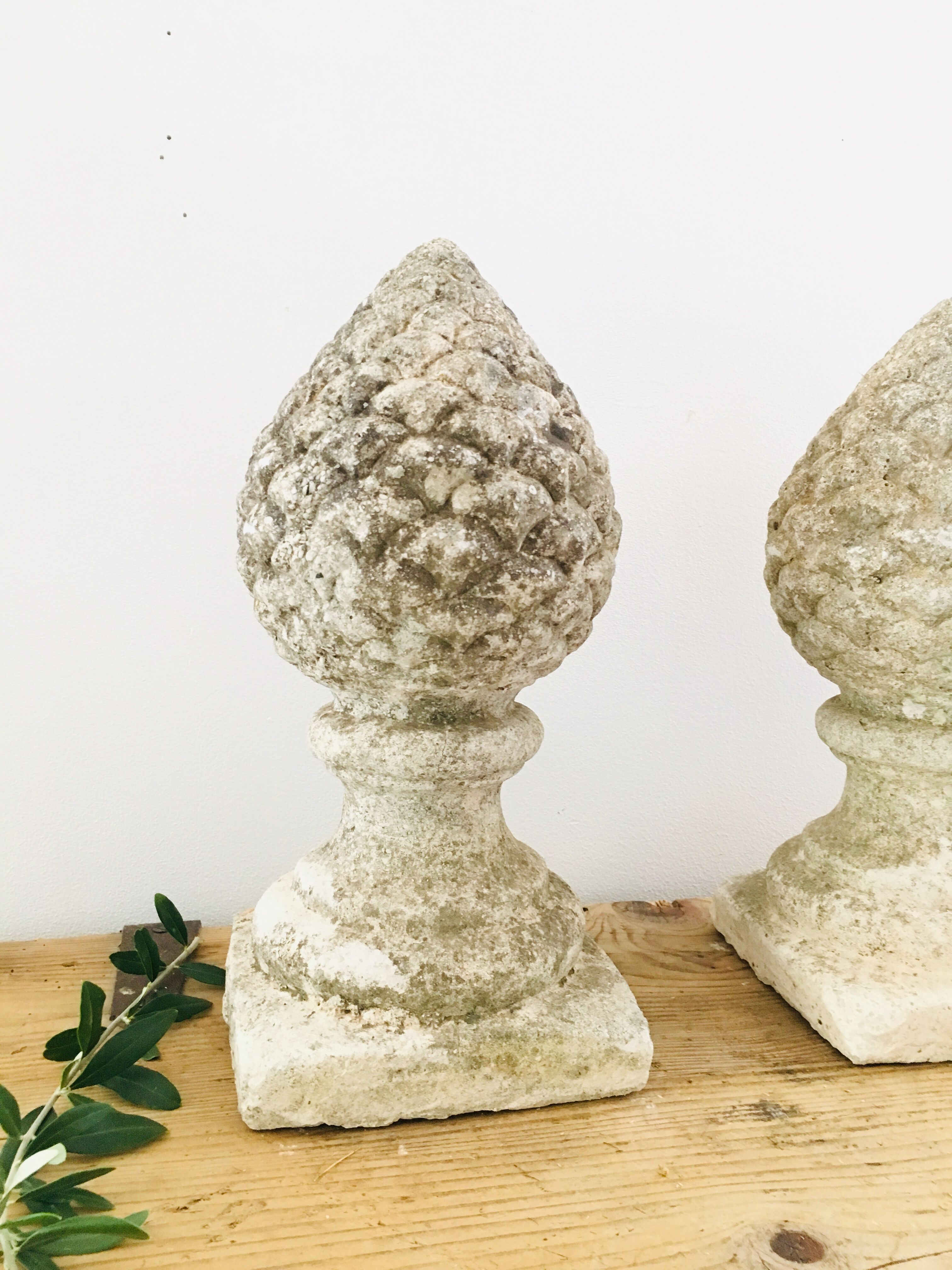 Pair of stone pine cones