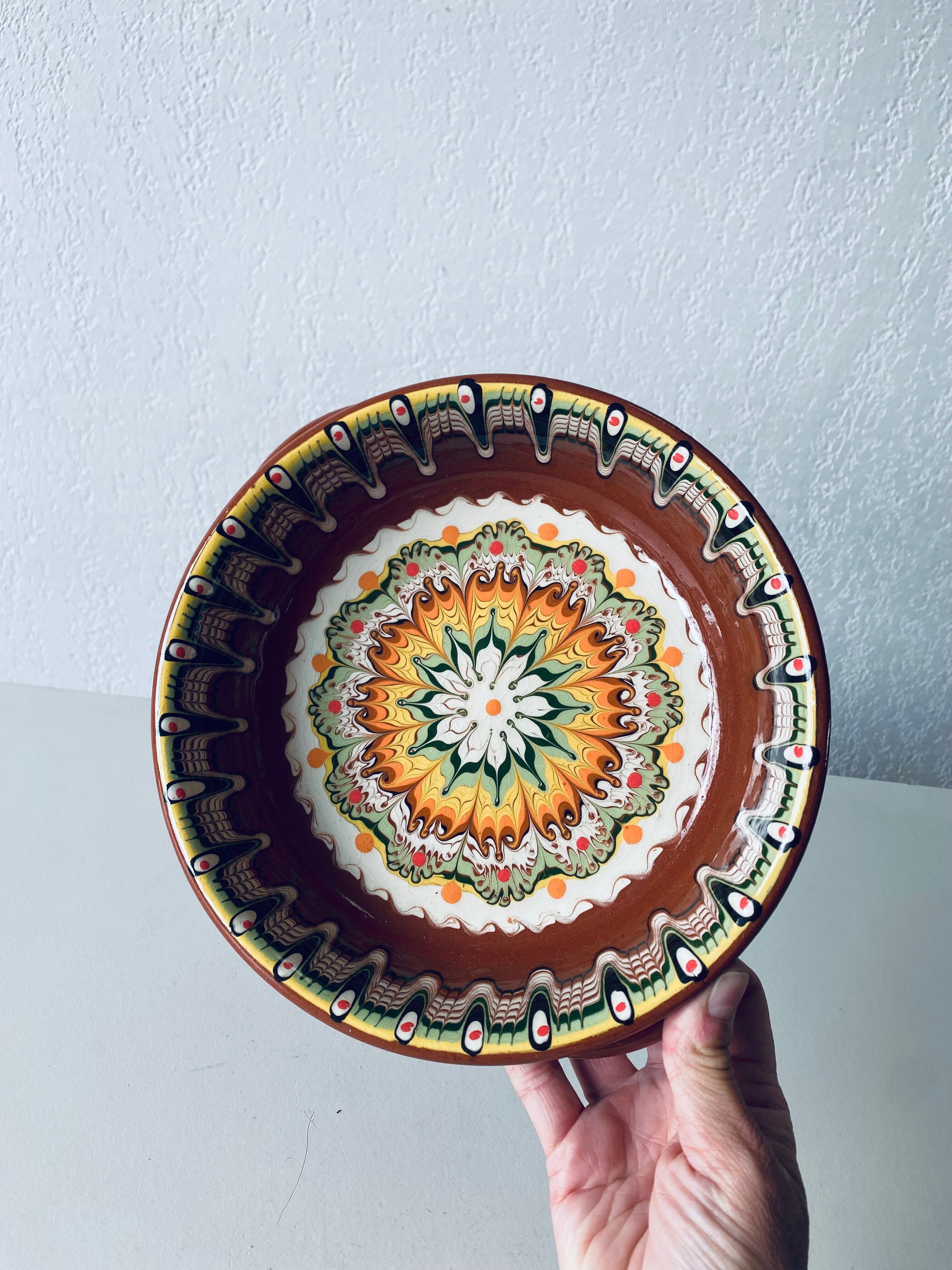 Colorful terracotta dish or salad bowl