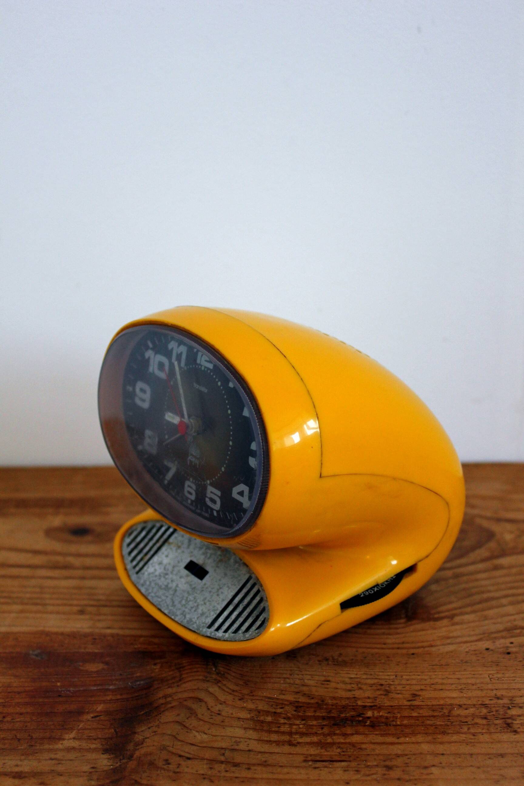 Japy yellow vintage space age alarm clock radio from the 70s