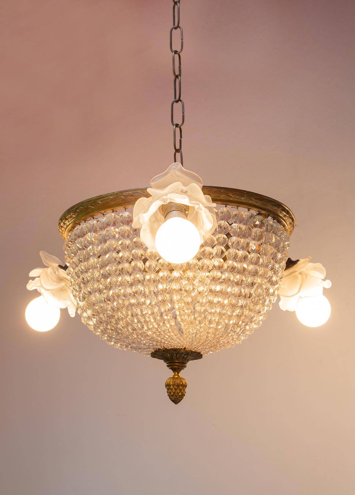 Old bronze ceiling light and 3 tulip flowers