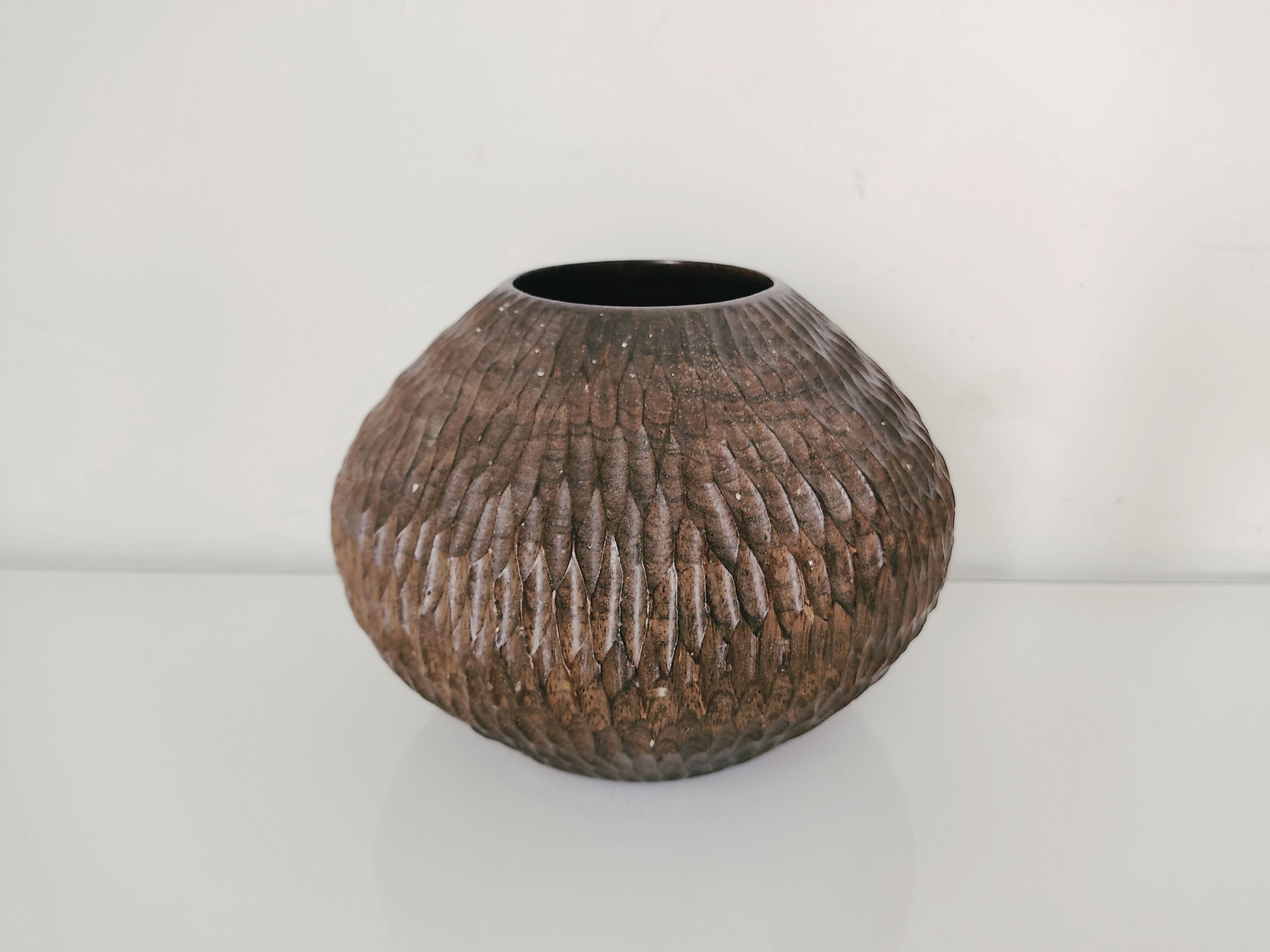 Carved wooden vase