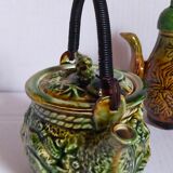 Set of old teapots and honey pot