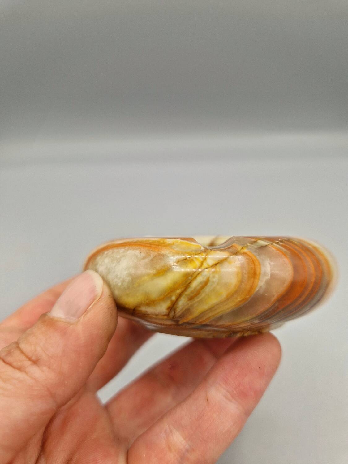 Small vintage onyx ashtray with three rests