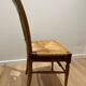 19th century straw chair with carved peacock back