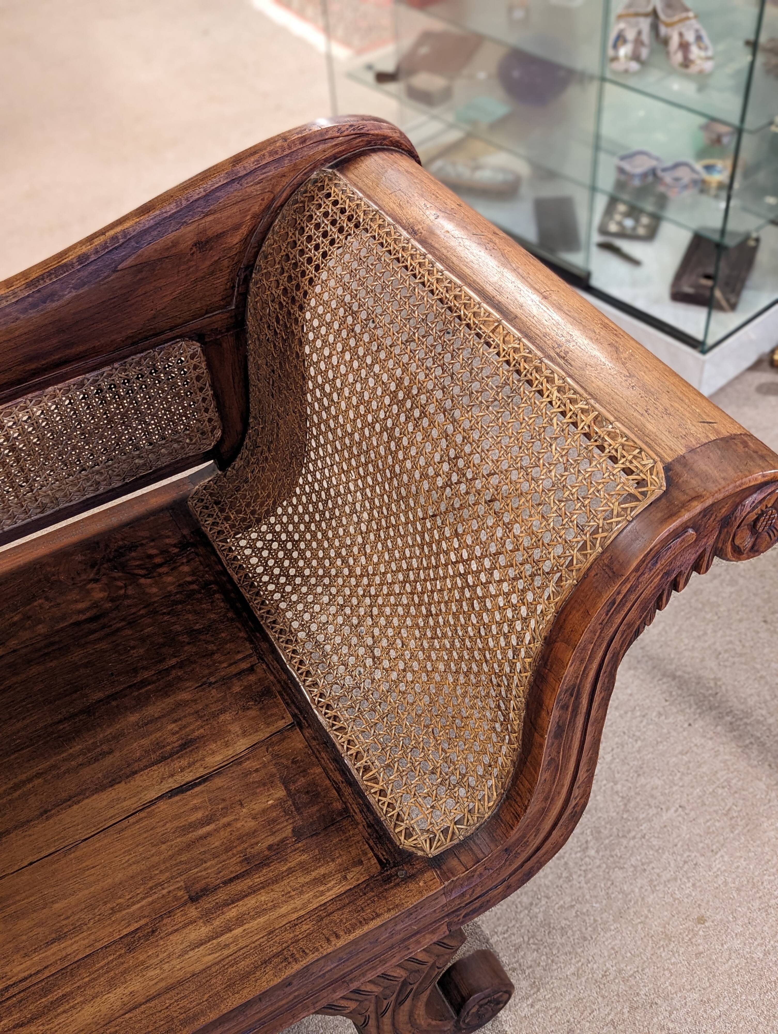 Large colonial caned bench